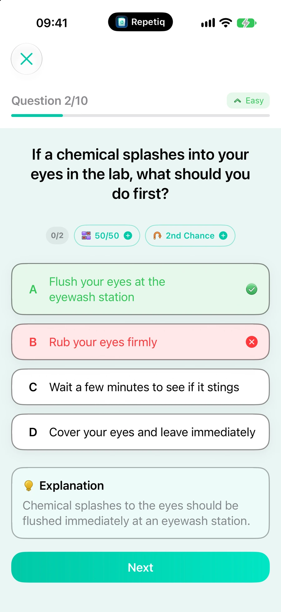 The same question after answering: the chosen option is marked wrong in red, the correct one in green, with a short explanation underneath.